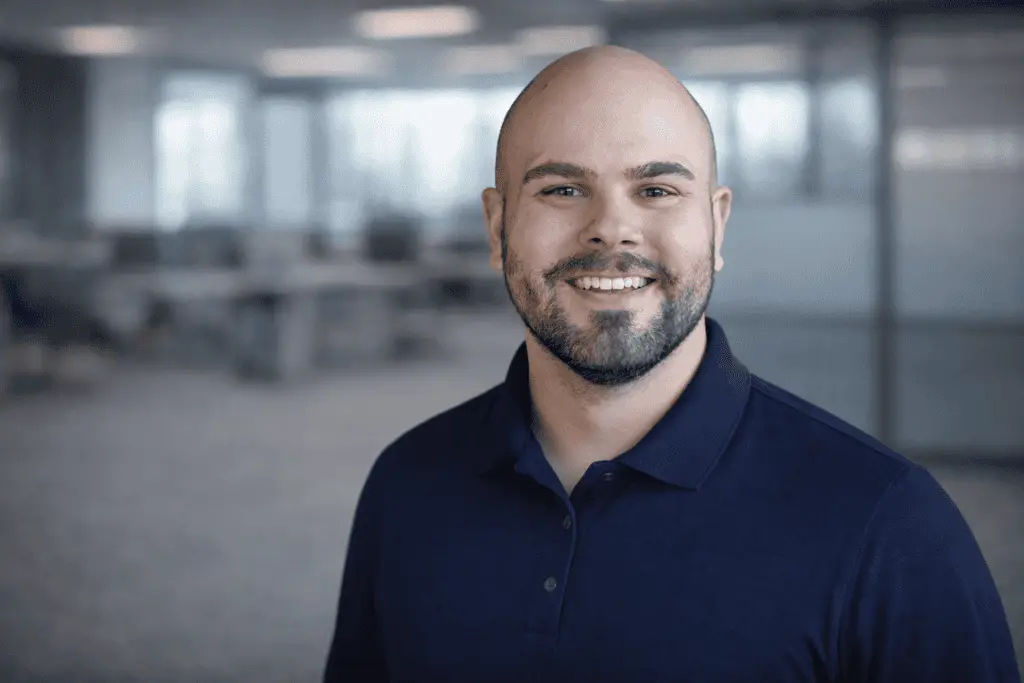 Professional portrait of a Brendan Morgan in an office setting for Black River Secure, a managed IT services company in Fuquay-Varina